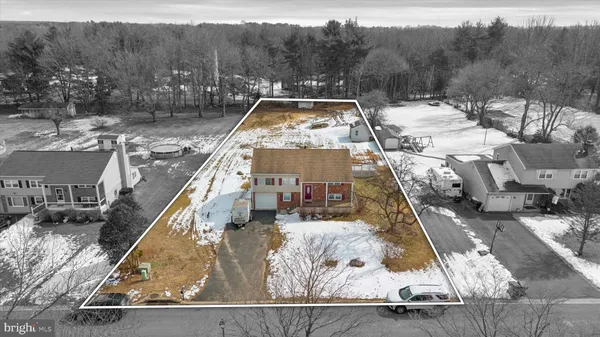 a view of a house with a park