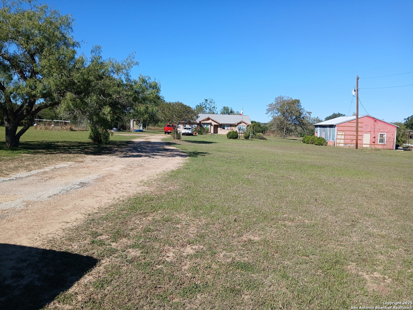 706 Thomaston River Road Cuero, TX 77954 - Photo 43 of 46 a view of a street with houses
