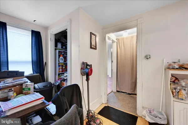 a room with furniture and a window