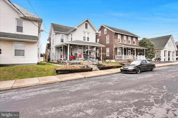 a front view of a building with street view