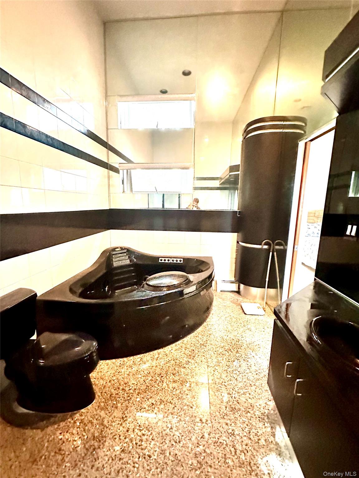 1027 Windermere Road Franklin Square, NY 11010 - Photo 19 of 43 a kitchen with a stove and a refrigerator