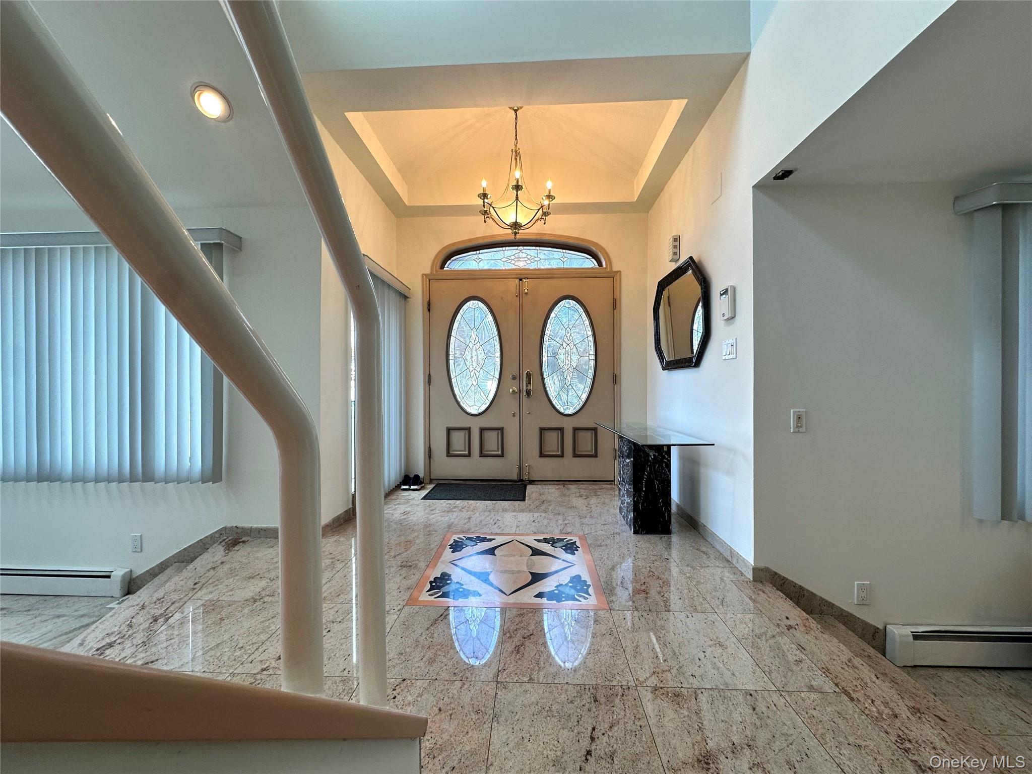1027 Windermere Road Franklin Square, NY 11010 - Photo 2 of 43 a view of a livingroom with furniture and front door