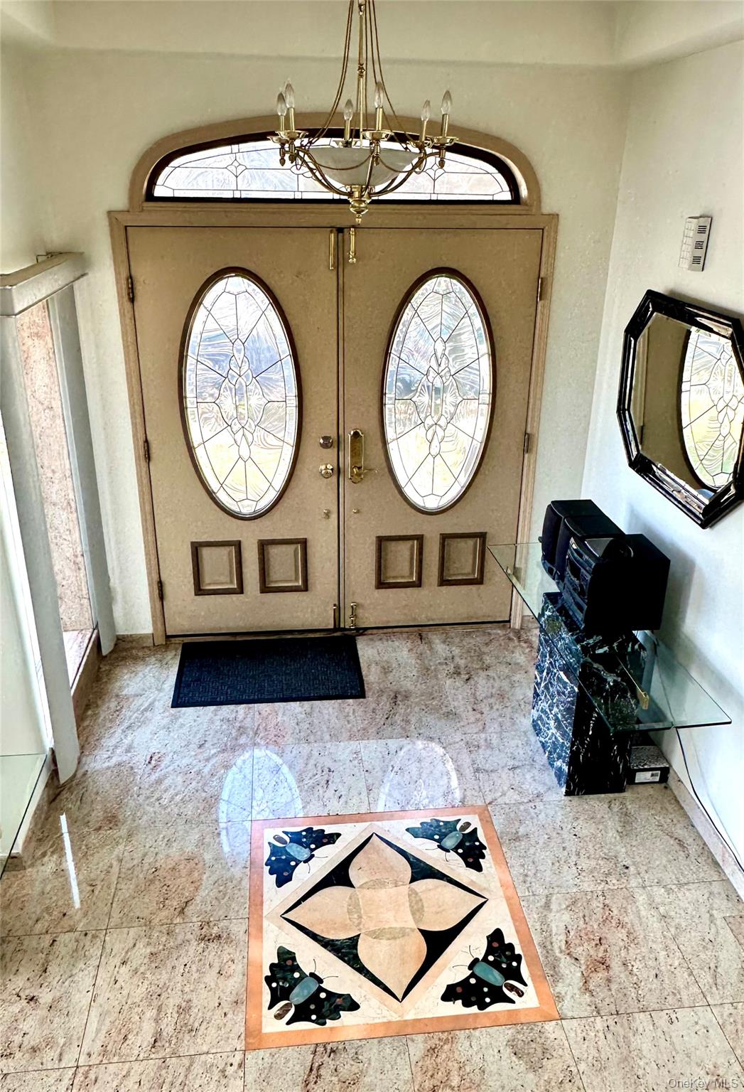 1027 Windermere Road Franklin Square, NY 11010 - Photo 24 of 43 a living room with wooden furniture and a wooden floor
