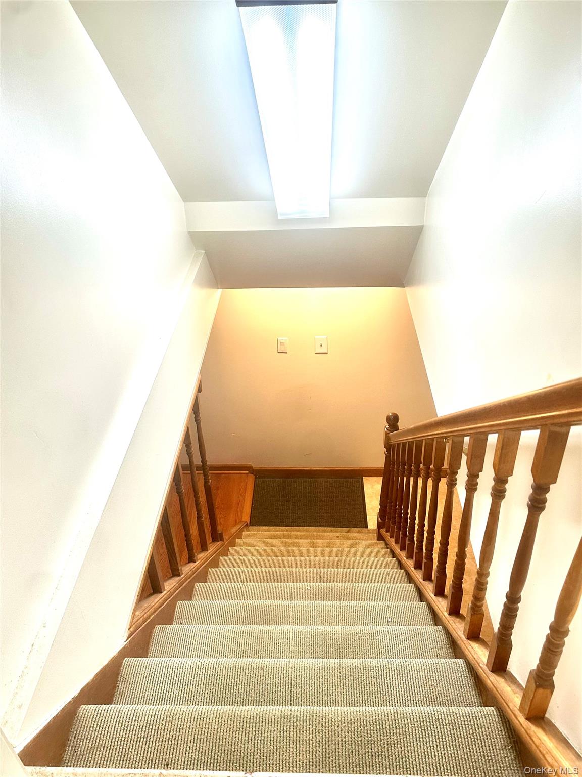1027 Windermere Road Franklin Square, NY 11010 - Photo 29 of 43 a bedroom with a bed and wooden floor
