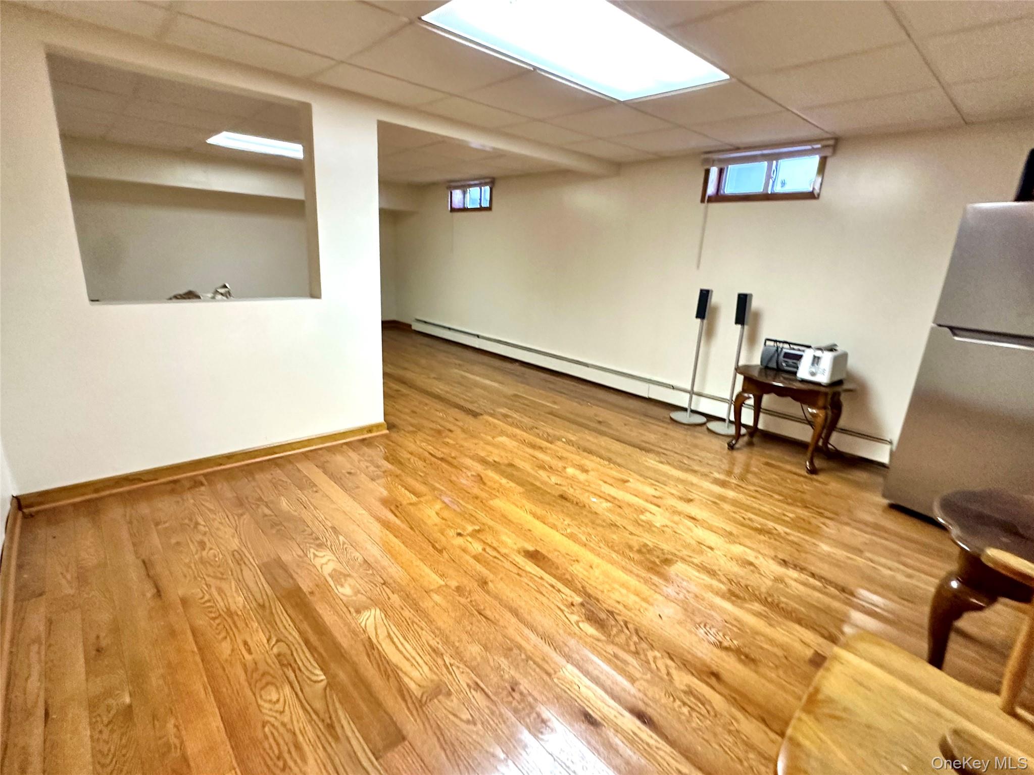 1027 Windermere Road Franklin Square, NY 11010 - Photo 30 of 43 a view of a room with wooden floor