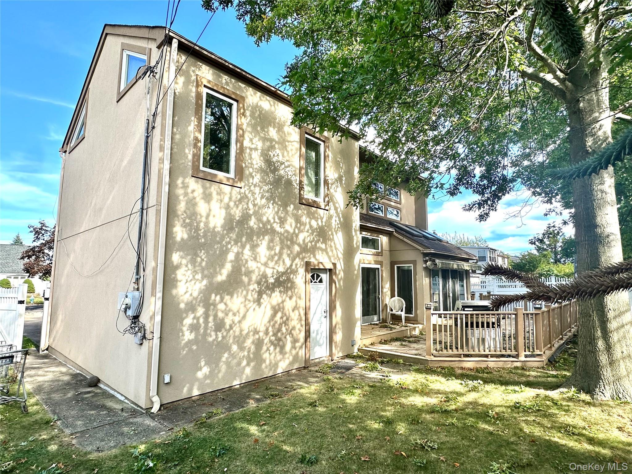 1027 Windermere Road Franklin Square, NY 11010 - Photo 41 of 43 a front view of a house with a yard