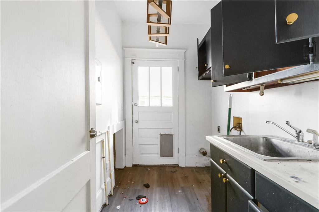 1329 Allene Avenue Southwest Atlanta, GA 30310 - Photo 14 of 20 a bathroom with a sink and a bathtub