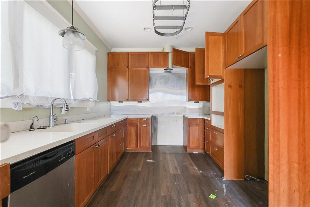 1329 Allene Avenue Southwest Atlanta, GA 30310 - Photo 17 of 20 a kitchen with stainless steel appliances a sink and a refrigerator