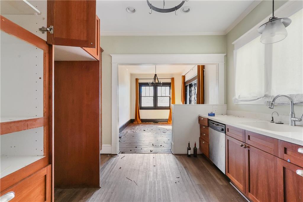 1329 Allene Avenue Southwest Atlanta, GA 30310 - Photo 18 of 20 a view of a bathroom with a sink and a window