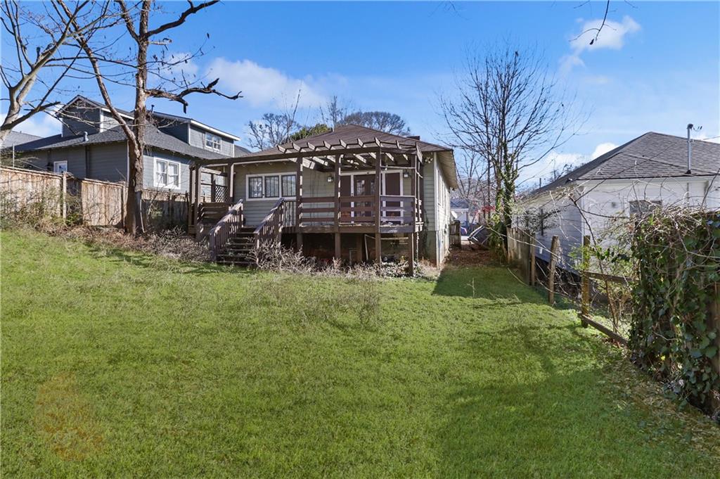 1329 Allene Avenue Southwest Atlanta, GA 30310 - Photo 20 of 20 a backyard of a house with table and chairs