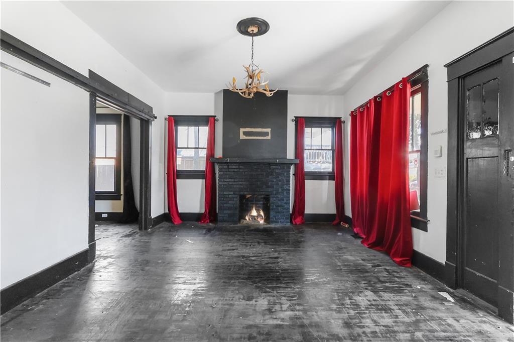 1329 Allene Avenue Southwest Atlanta, GA 30310 - Photo 5 of 20 a view of a windows fire place and windows in a room