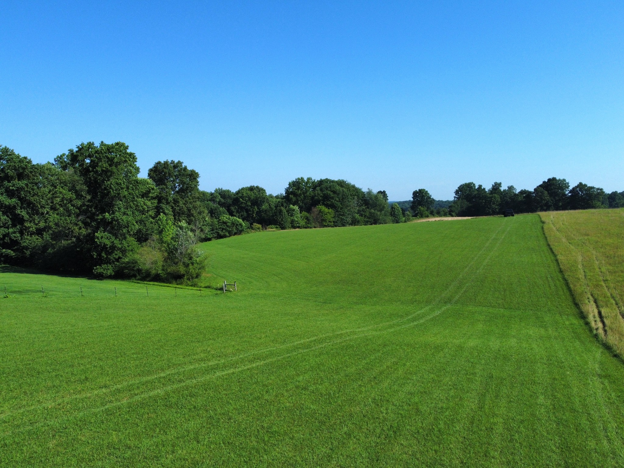 2257 Celina Road Red Boiling Springs, TN 37150 - Photo 1 of 9 a view of a grassy field with trees