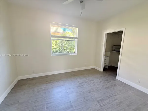 a bathroom with sink and mirror