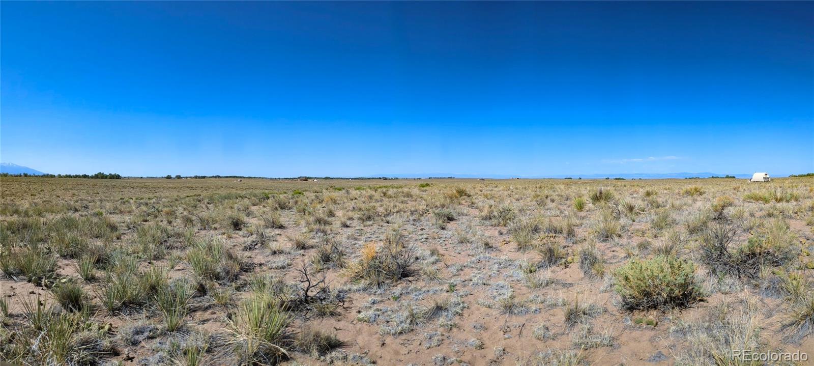 878 Birch Road Crestone, CO 81131 - Photo 10 of 11 a view of a field with an ocean