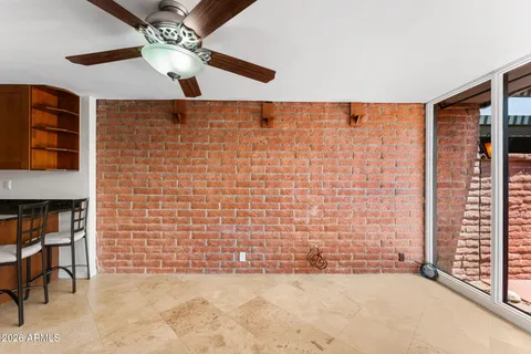a view of a livingroom and a kitchen
