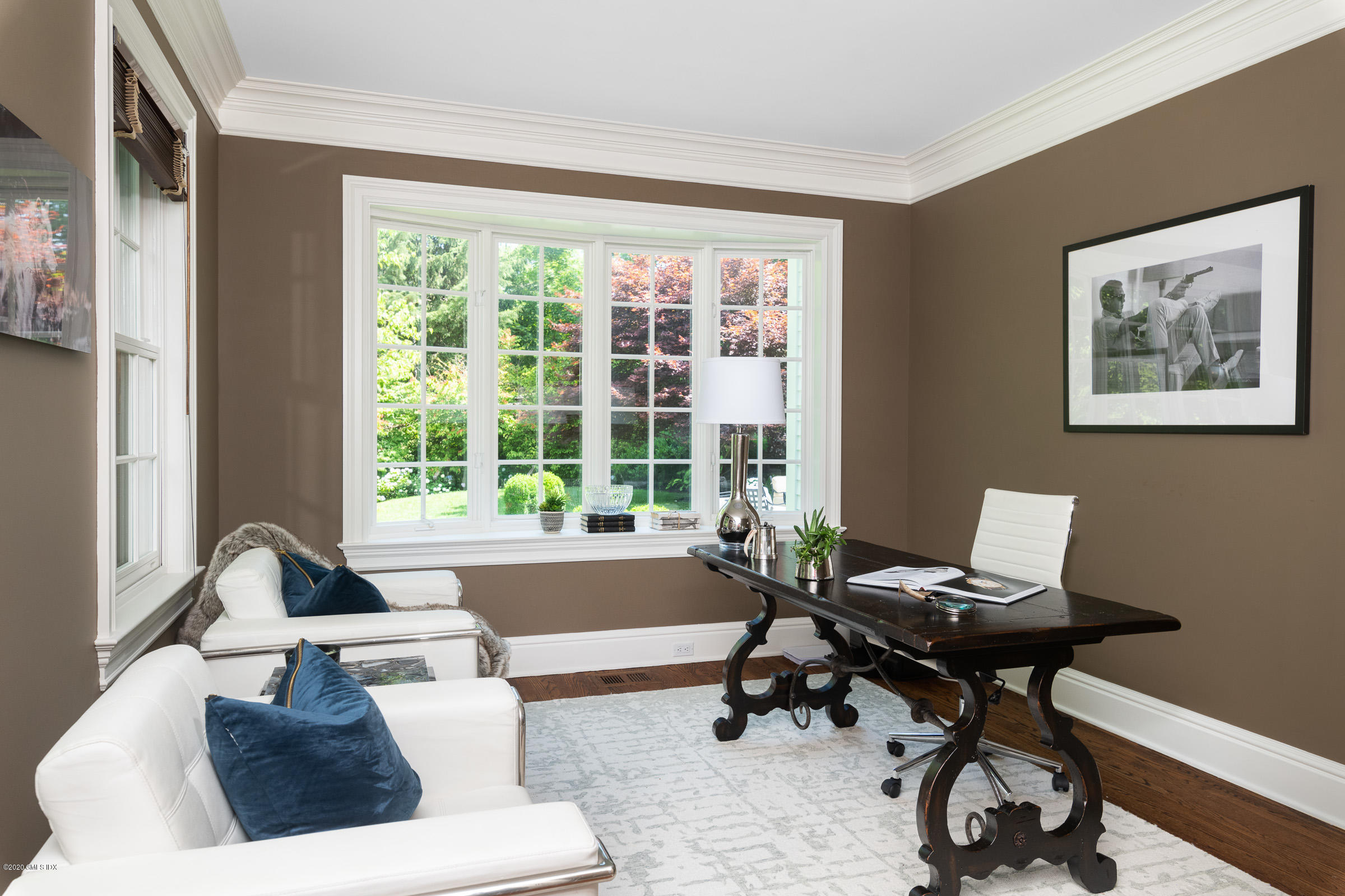123 Valley Drive Greenwich, CT 06831 - Photo 17 of 48 a living room with furniture and a window