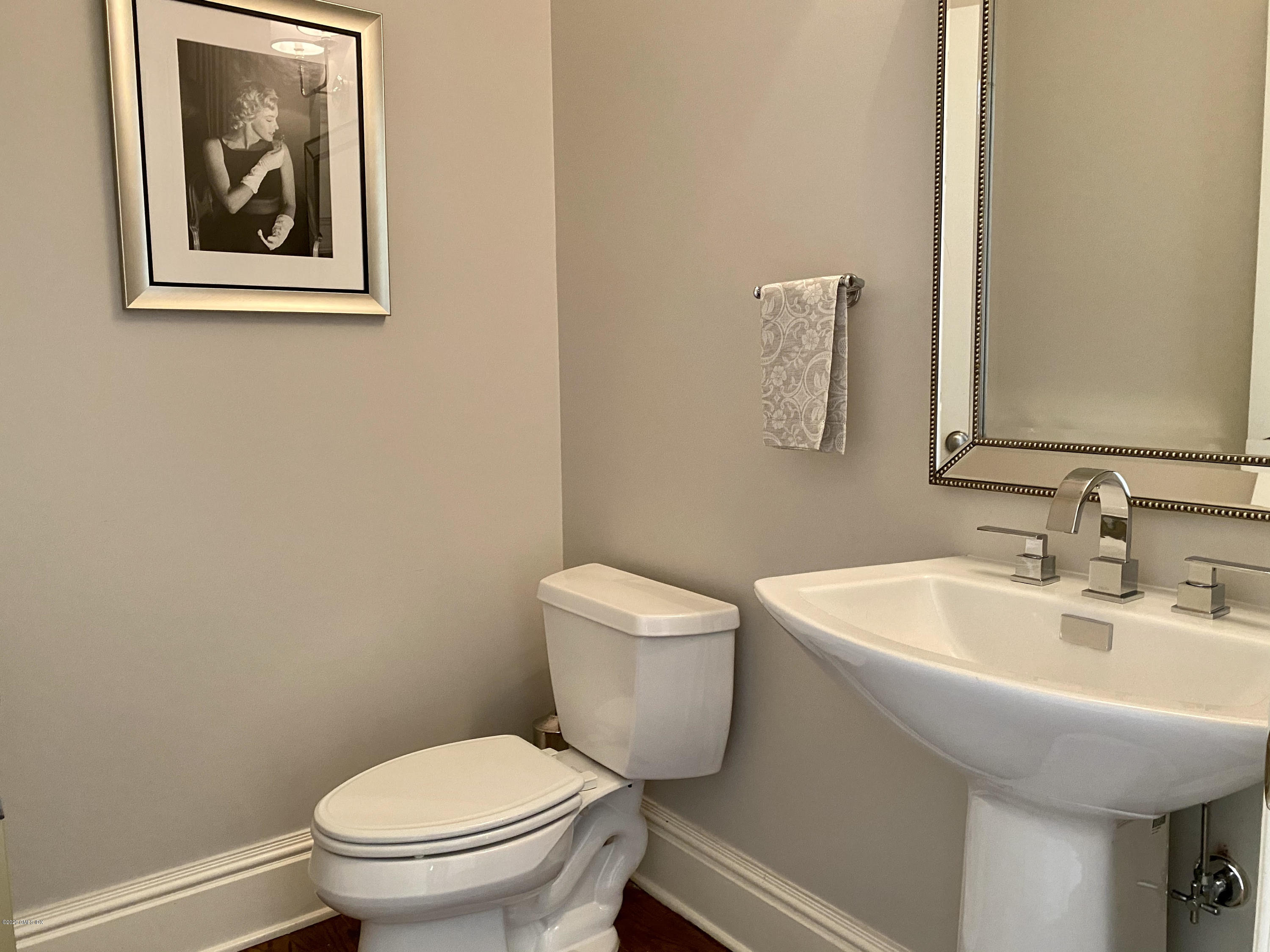 123 Valley Drive Greenwich, CT 06831 - Photo 18 of 48 a bathroom with a toilet and sink