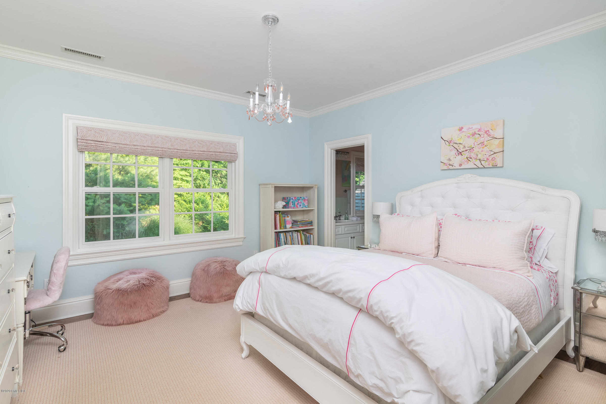 123 Valley Drive Greenwich, CT 06831 - Photo 24 of 48 a spacious bedroom with a bed and a window