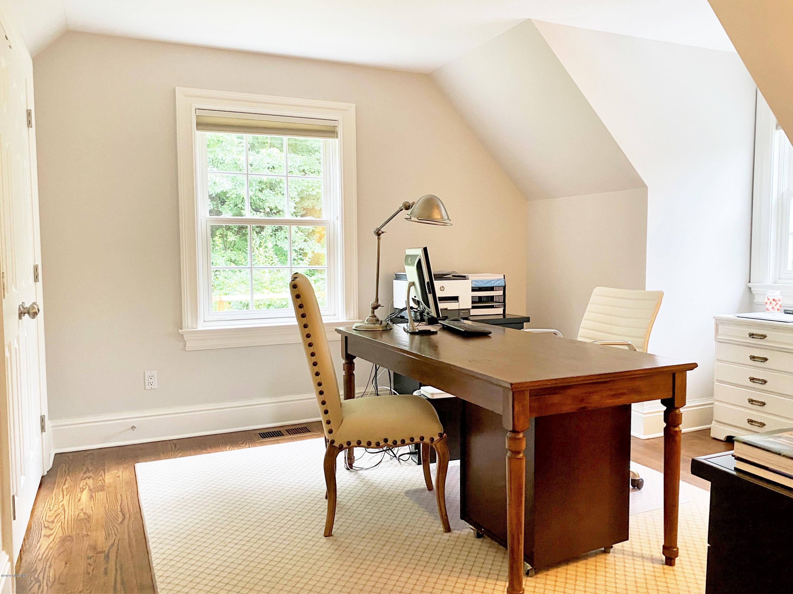 123 Valley Drive Greenwich, CT 06831 - Photo 28 of 48 a view of a dining room with furniture and window