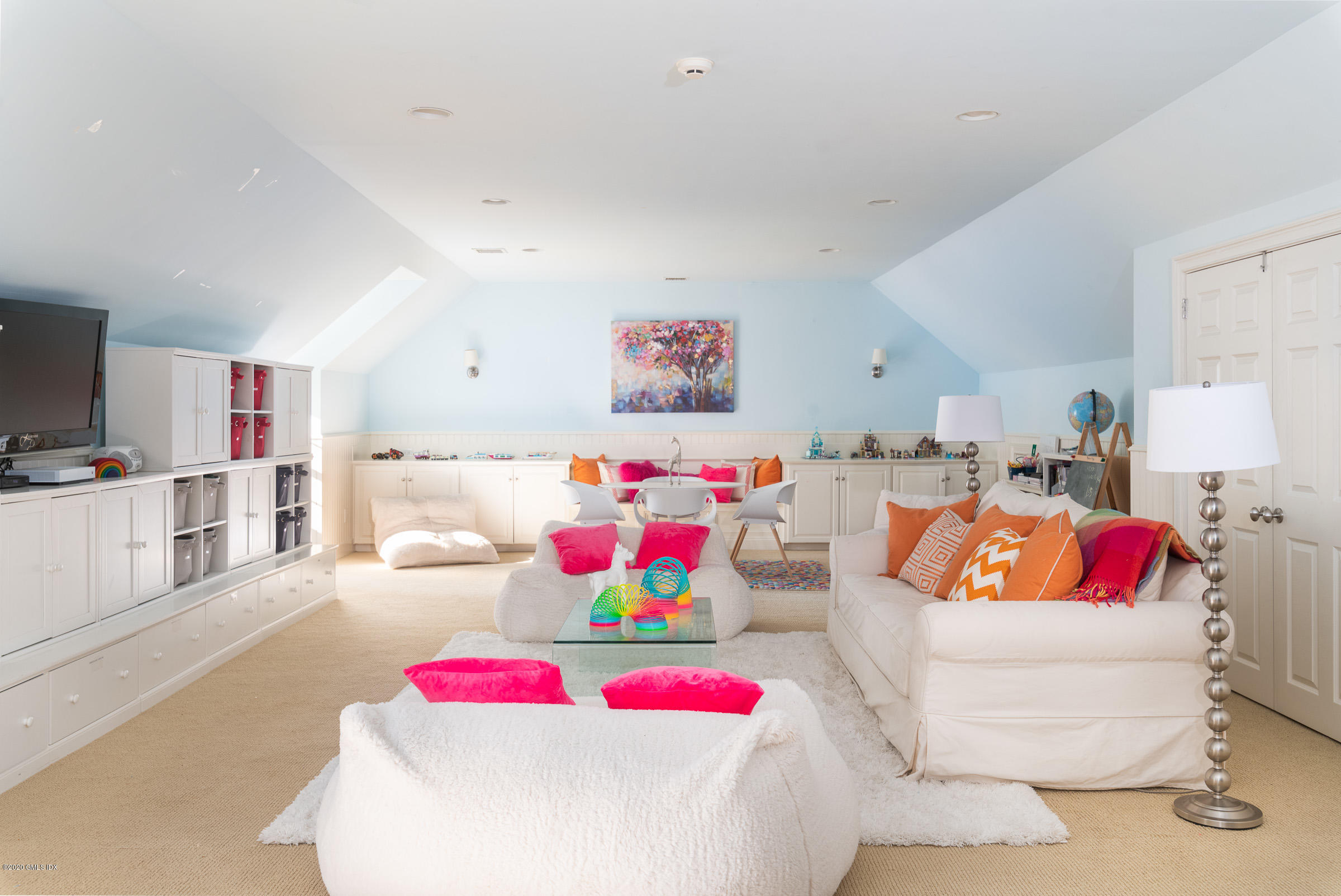 123 Valley Drive Greenwich, CT 06831 - Photo 29 of 48 a living room with kitchen island stainless steel appliances furniture and a kitchen view