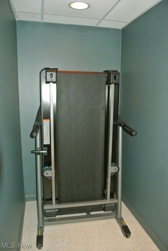 1804 Springfield Center Road Akron, OH 44312 - Photo 34 of 37 Workout room with a paneled ceiling