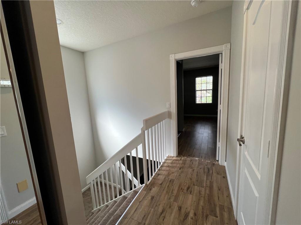 5365 Cove Circle, Unit 125 Naples, FL 34119 - Photo 36 of 36 a view of a hallway