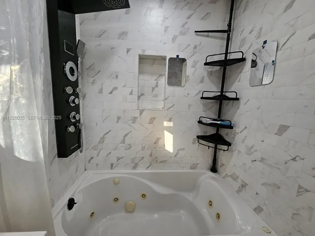 a bathroom with a bathtub