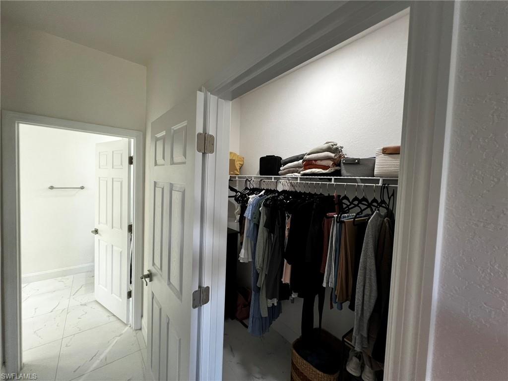 3313 68th Street West Lehigh Acres, FL 33971 - Photo 16 of 26 Spacious closet featuring marble finish floor