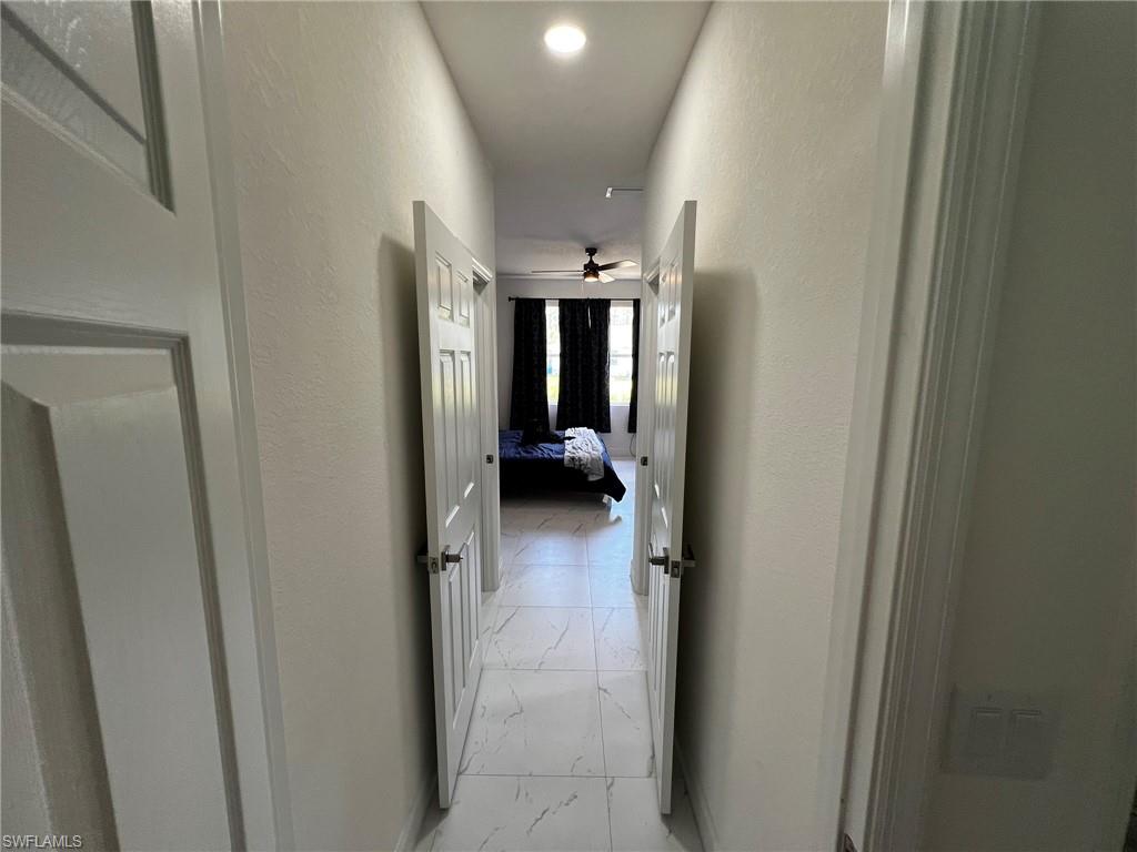 3313 68th Street West Lehigh Acres, FL 33971 - Photo 17 of 26 Hall with marble finish floor
