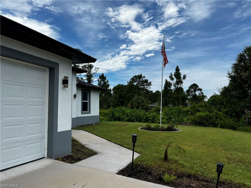3313 68th Street West Lehigh Acres, FL 33971 - Photo 4 of 26 View of yard