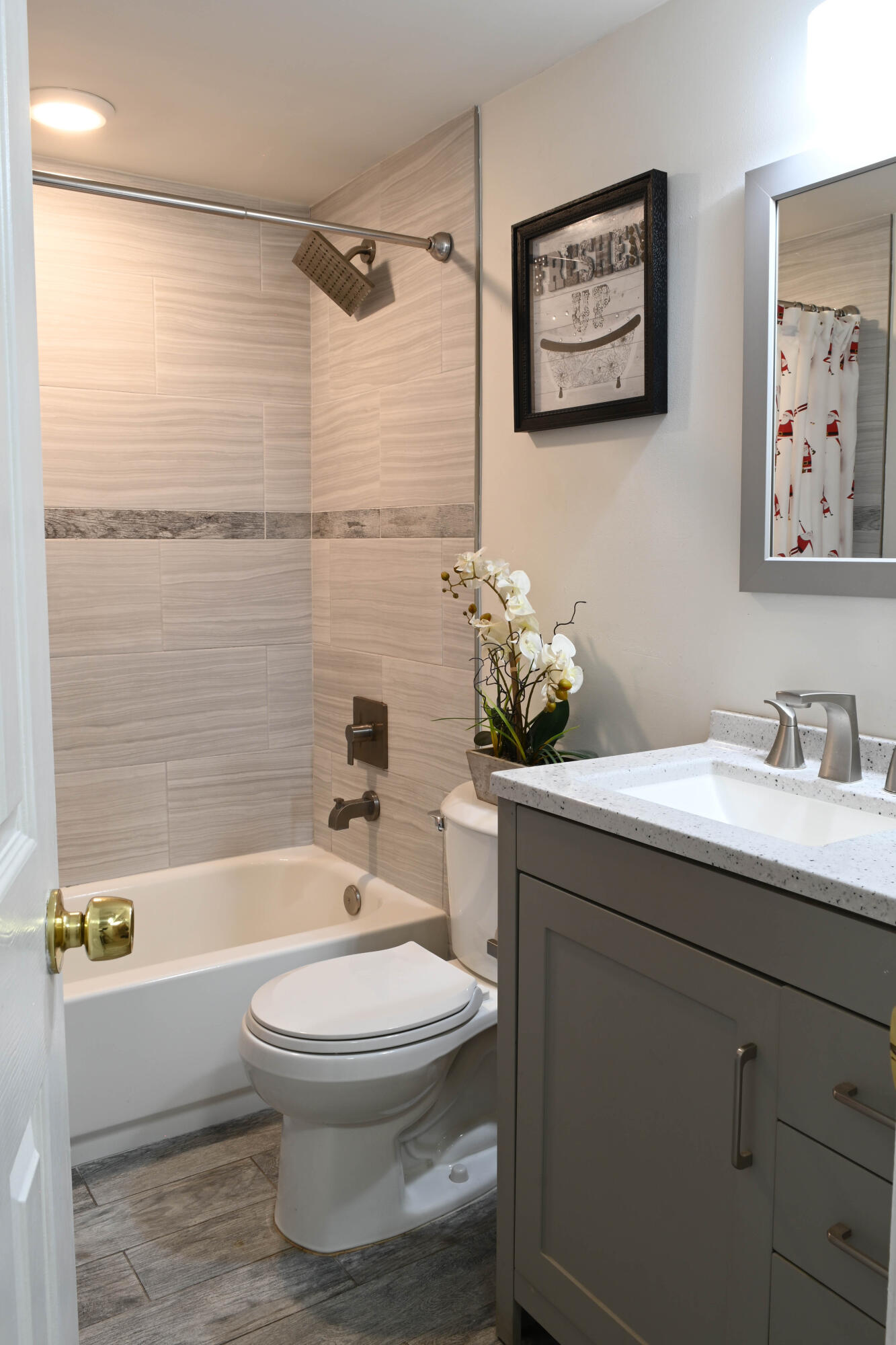 8400 Southwest 133rd Avenue Road, Unit 311 Miami, FL 33183 - Photo 9 of 11 a bathroom with a granite countertop toilet a sink and bathtub