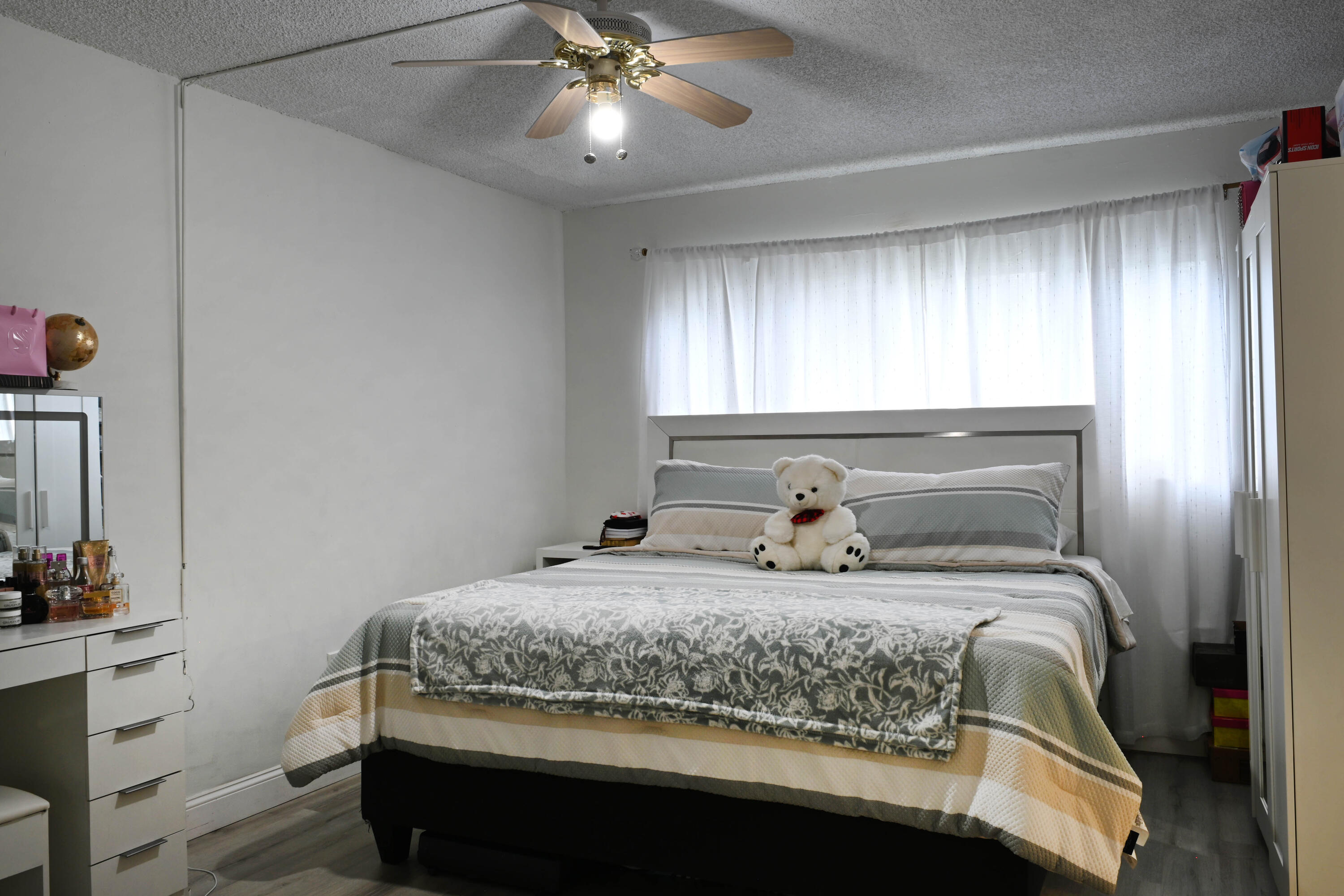 8400 Southwest 133rd Avenue Road, Unit 311 Miami, FL 33183 - Photo 10 of 11 a bedroom with a bed and window