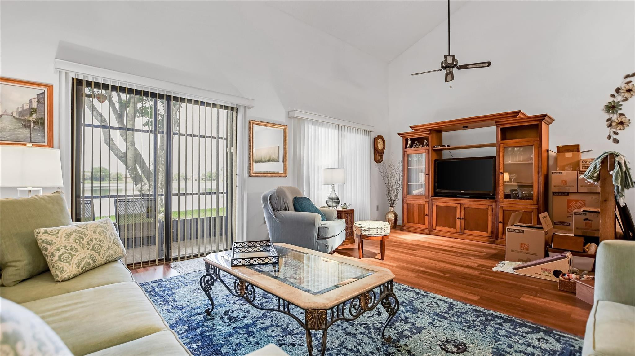 4285 South Pine Island Road, Unit 4285 Davie, FL 33328 - Photo 14 of 35 a living room with furniture and a flat screen tv