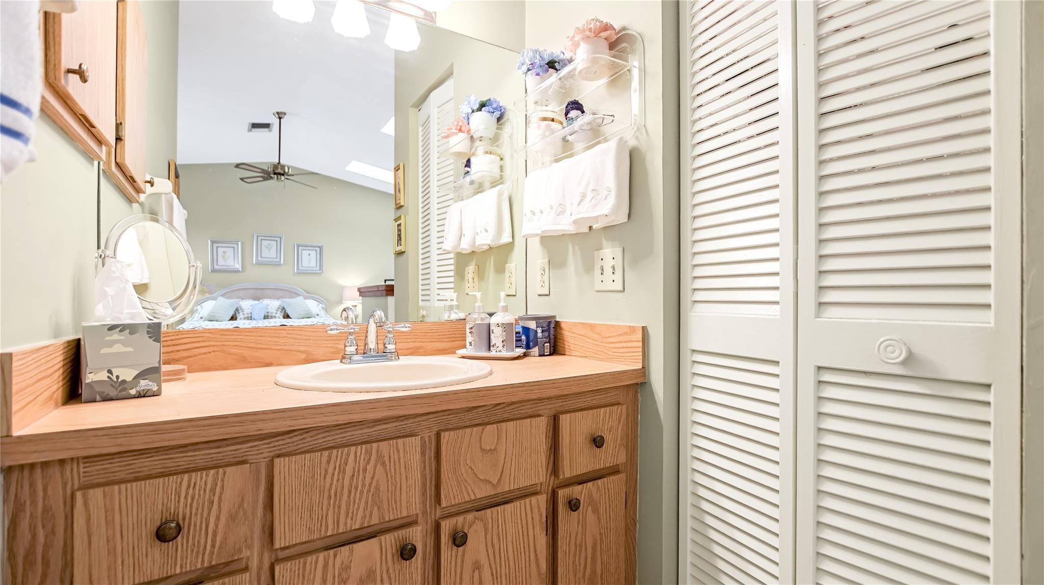 4285 South Pine Island Road, Unit 4285 Davie, FL 33328 - Photo 19 of 35 a bathroom with a sink and a mirror