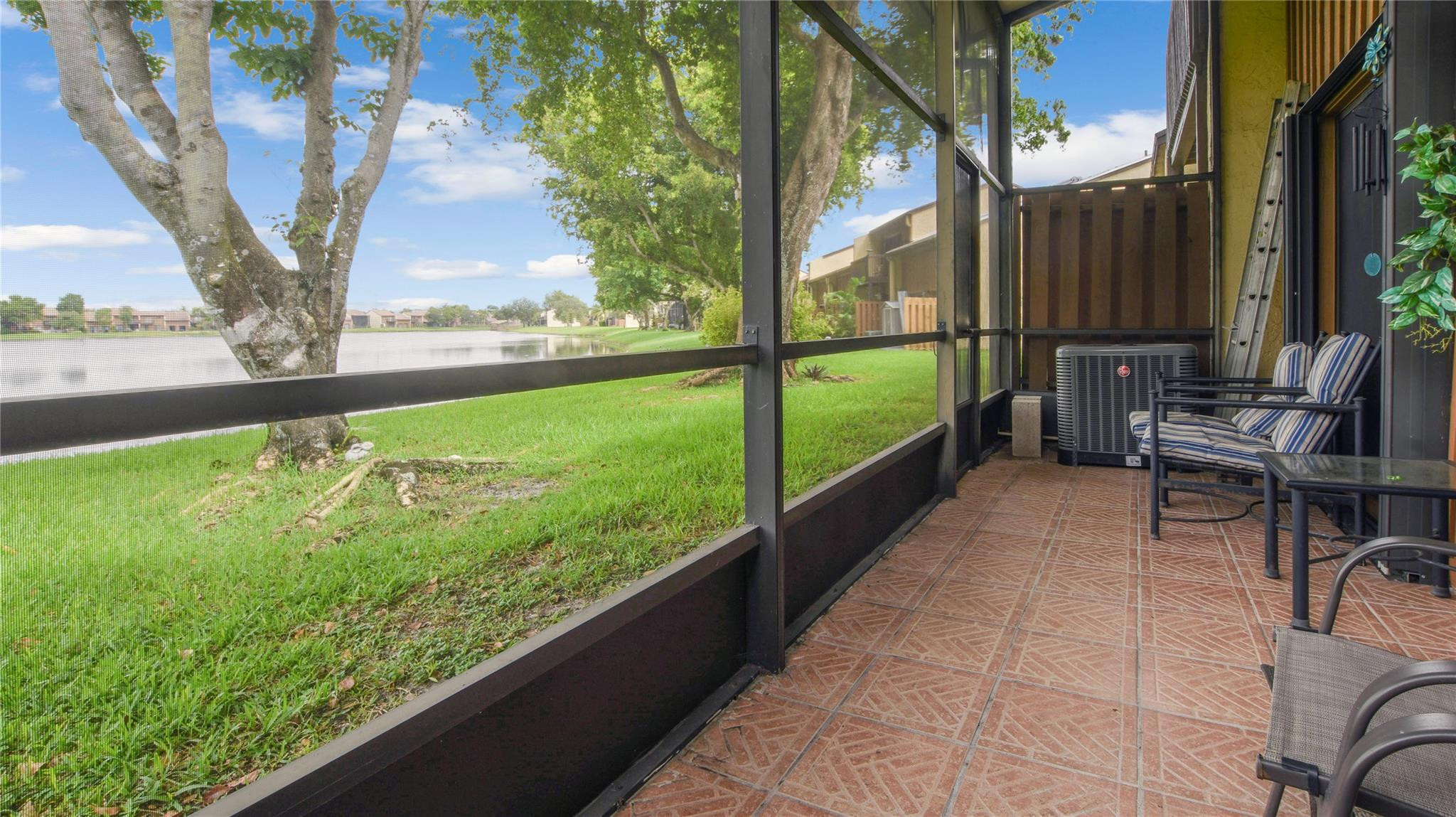 4285 South Pine Island Road, Unit 4285 Davie, FL 33328 - Photo 25 of 35 a view of balcony with chairs
