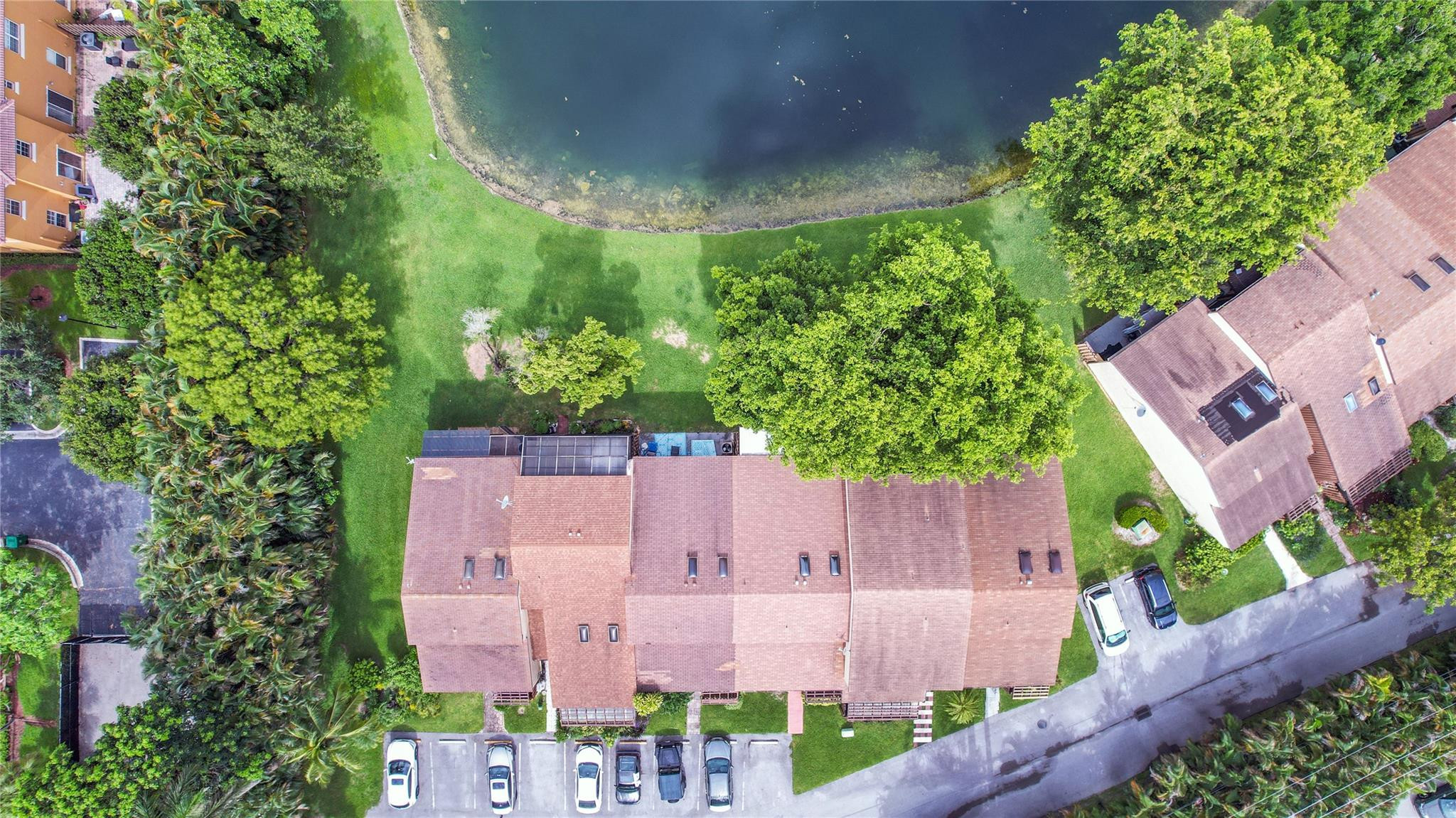 4285 South Pine Island Road, Unit 4285 Davie, FL 33328 - Photo 29 of 35 an aerial view of residential houses with outdoor space and trees all around