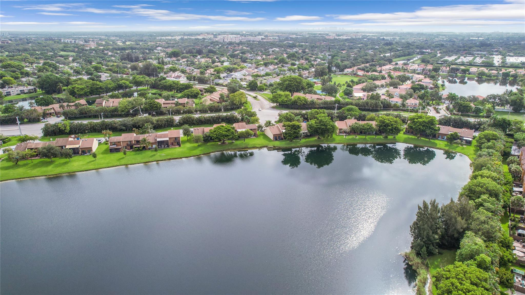 4285 South Pine Island Road, Unit 4285 Davie, FL 33328 - Photo 31 of 35 an aerial view of a house with a lake view