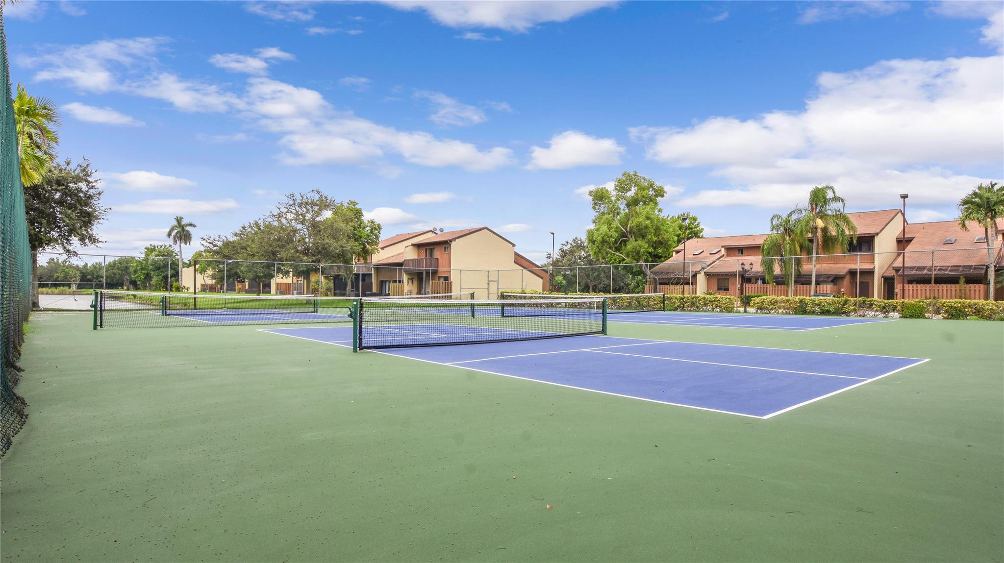4285 South Pine Island Road, Unit 4285 Davie, FL 33328 - Photo 32 of 35 a view of tennis court
