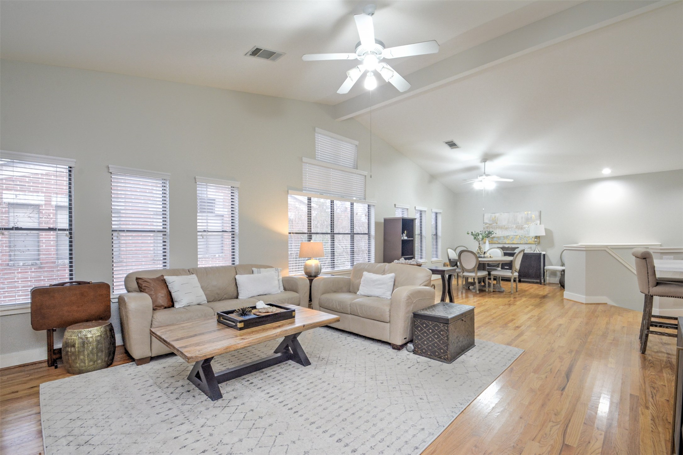 5225 Cornish Street, Unit 1 Houston, TX 77007 - Photo 11 of 22 a living room with furniture potted plant and a large window