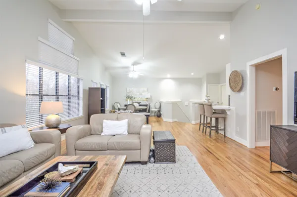 a living room with furniture and a table