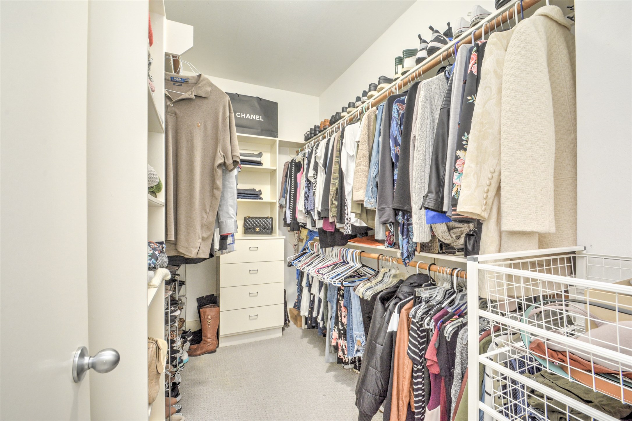 5225 Cornish Street, Unit 1 Houston, TX 77007 - Photo 22 of 22 a view of walk in closet with clothes and shoes