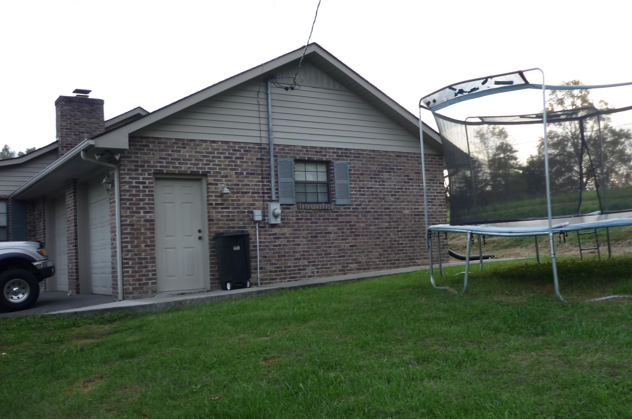 1208 Tater Valley Road Washburn, TN 37888 - Photo 2 of 20 right side-garage entrance