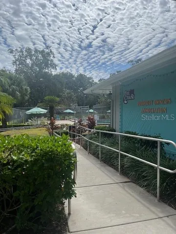 a view of a playground with a swimming pool
