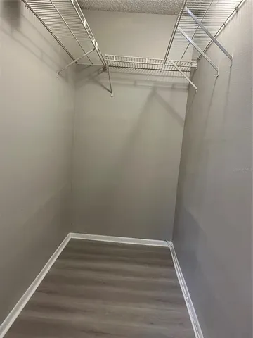 a view of a room with racks on the wall