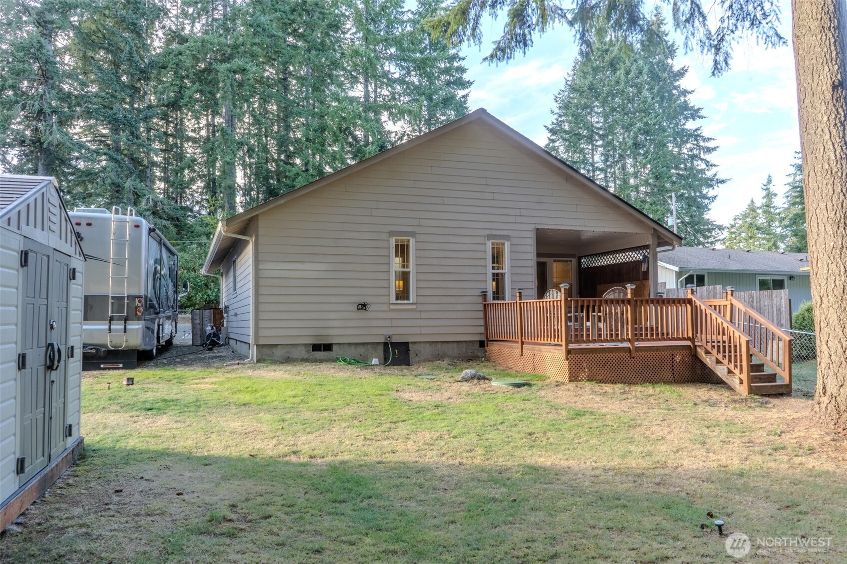 121 East Stavis Road Shelton, WA 98584 - Photo 17 of 35 a view of a house with a yard and a house