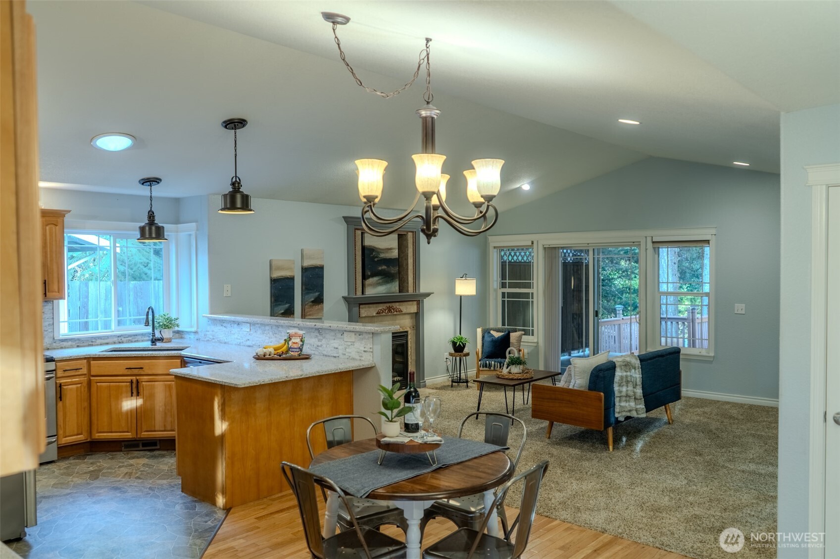121 East Stavis Road Shelton, WA 98584 - Photo 2 of 35 a view of a dining room with furniture and a chandelier