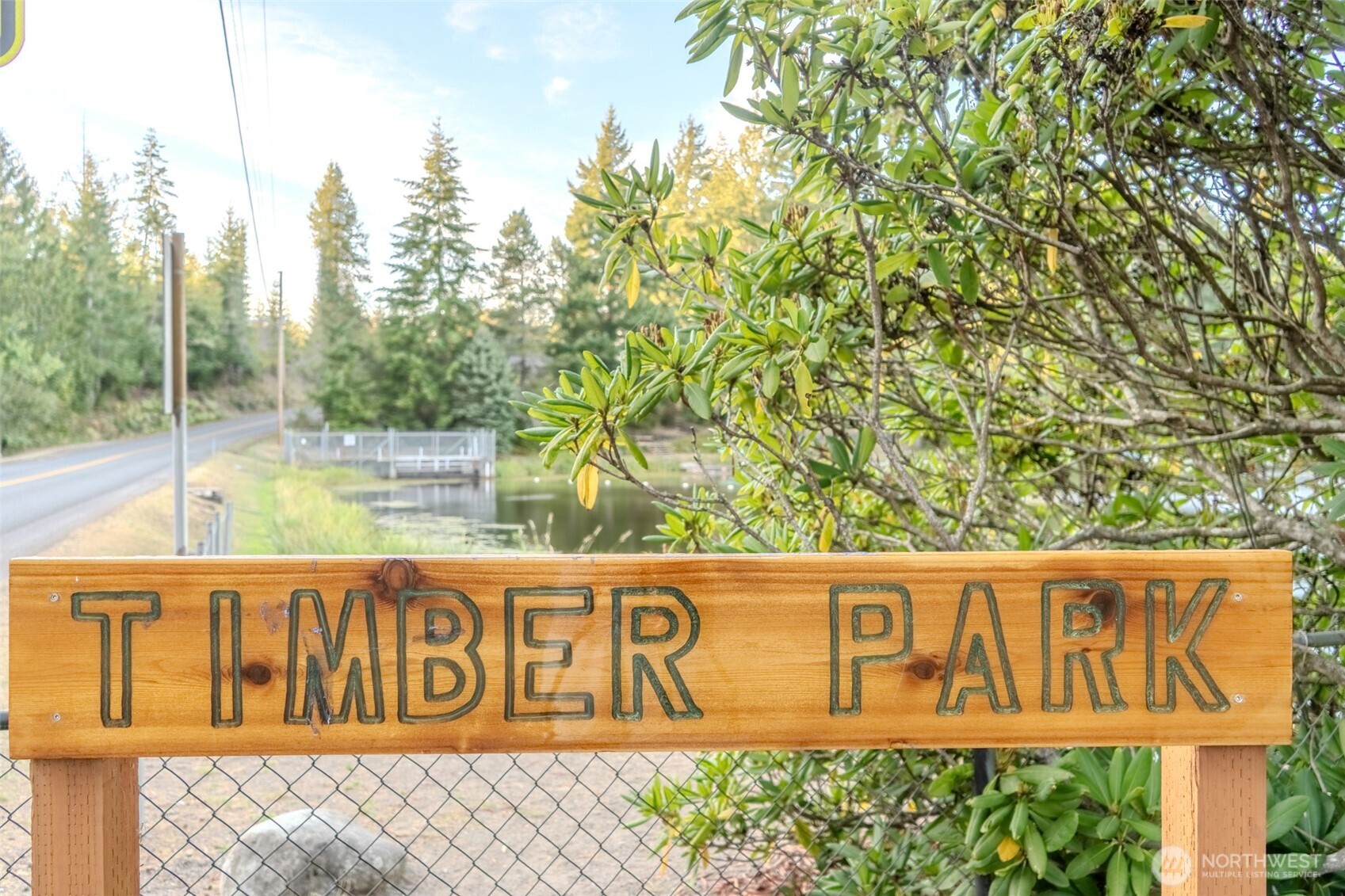 121 East Stavis Road Shelton, WA 98584 - Photo 21 of 35 a street sign that is on the side of a building