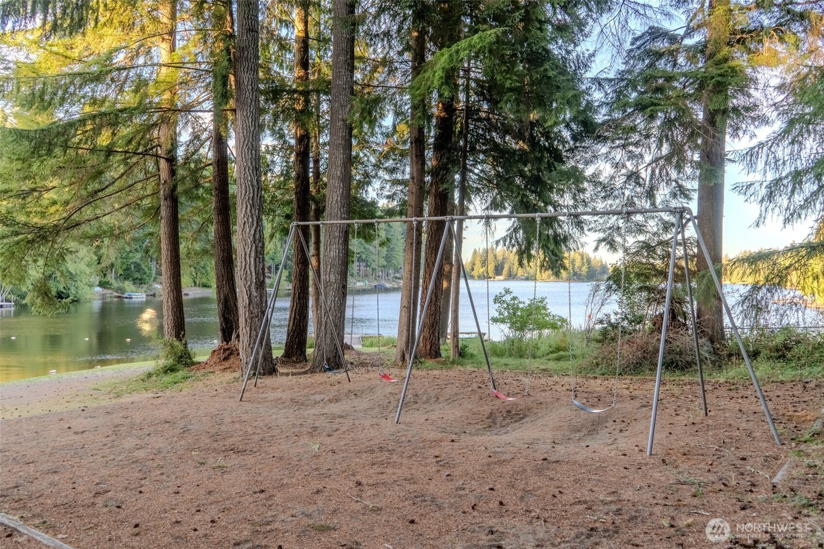 121 East Stavis Road Shelton, WA 98584 - Photo 24 of 35 a backyard of a house with lots of green space