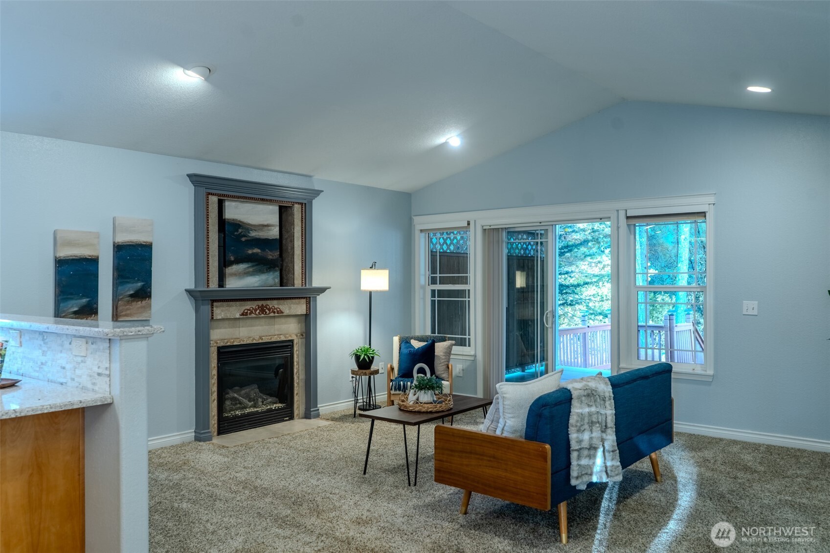 121 East Stavis Road Shelton, WA 98584 - Photo 5 of 35 a living room with furniture and a fireplace