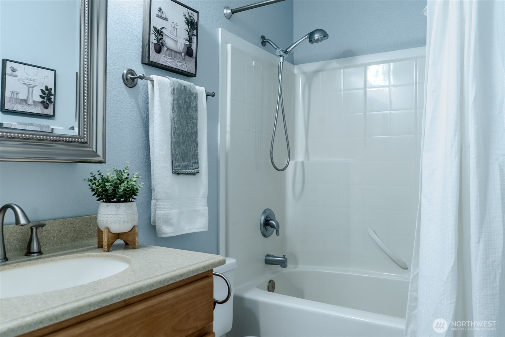 121 East Stavis Road Shelton, WA 98584 - Photo 7 of 35 a bathroom with a sink a toilet and shower